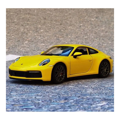1:24 Porsche 911 Carrera 4S diecast model - yellow view
