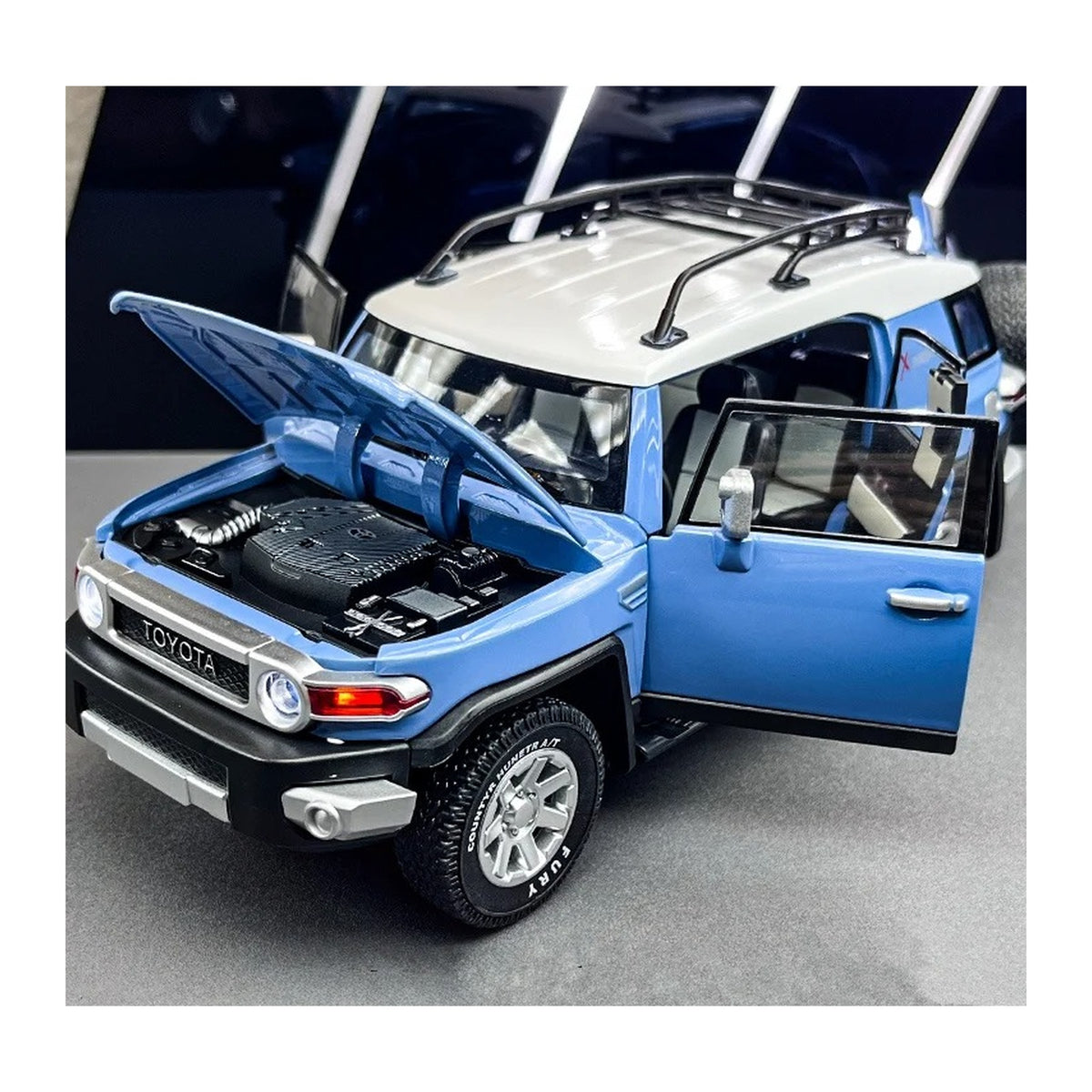 1:24 Toyota FJ Cruiser diecast model - blue opening view