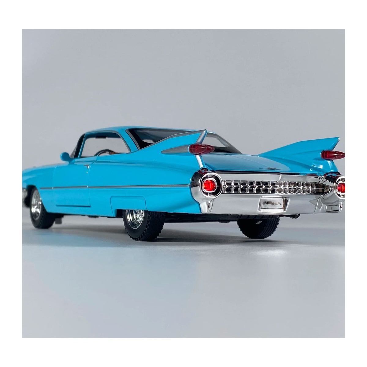 1:24 1959 Cadillac Eldorado Biarritz diecast model - blue rear view