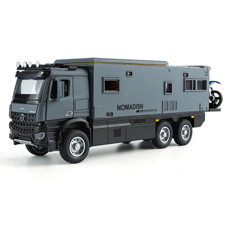 Gray 1:24 NOMADISM expedition RV diecast model, left-facing view on white background